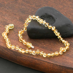 Collier de dents en ambre pour bébé