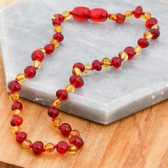 Collier de dents en ambre pour bébé