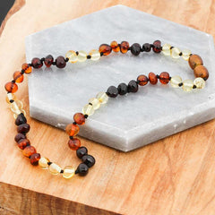 Collier de dents en ambre pour bébé