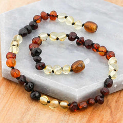 Collier de dents en ambre pour bébé