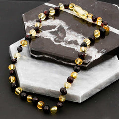 Collier de dents en ambre pour bébé