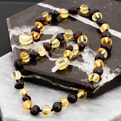 Collier de dents en ambre pour bébé