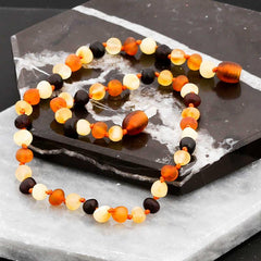 Collier de dents en ambre pour bébé