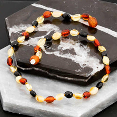 Collier de dents en ambre pour bébé