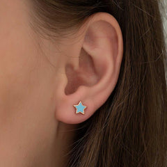 Boucles d'oreilles étoile bleue fluorescente argentée