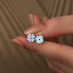 Boucles d'oreilles trèfle bleu fluorescent argenté