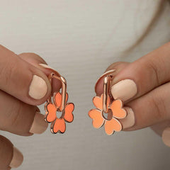 Boucles d'oreilles trèfle orange fluorescent argenté