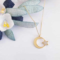 Collier pour femme en argent et or avec croissant d'étoile