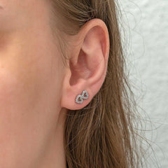Boucles d'oreilles pour femme en argent avec deux cœurs cloutés