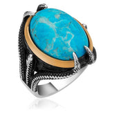 Bague pour homme en argent et pierre turquoise à griffes d'aigle