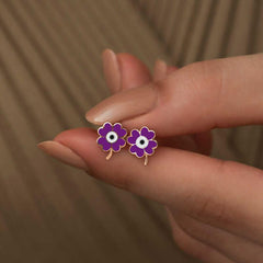 Boucles d'oreilles trèfle violet argenté