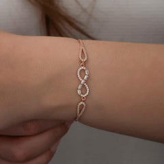 Bracelet infini en argent et pierre baguette rose