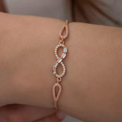 Bracelet infini en argent et pierre baguette rose