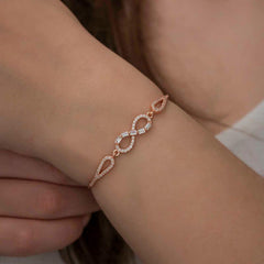 Bracelet infini en argent et pierre baguette rose