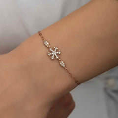 Bracelet femme flocon de neige rose argenté