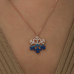 Collier flocon de neige en argent et pierre bleue rose