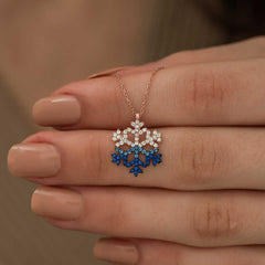 Collier flocon de neige en argent et pierre bleue rose