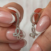 Boucles d'oreilles papillon pendantes en argent pour femme