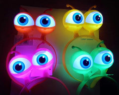 Couronne d'œil extraterrestre colorée Nessiworld avec 3 fonctions différentes et éclairage LED, 1 pièce 18 x 12 cm