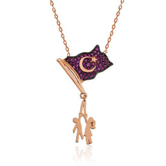 Collier pour enfants tenant un drapeau en argent