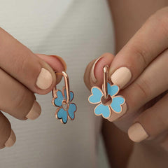 Boucles d'oreilles trèfle bleu fluorescent argenté