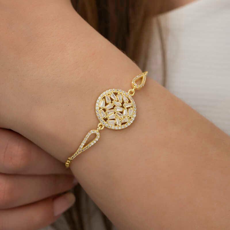 Bracelet en argent et or avec pierres baguettes