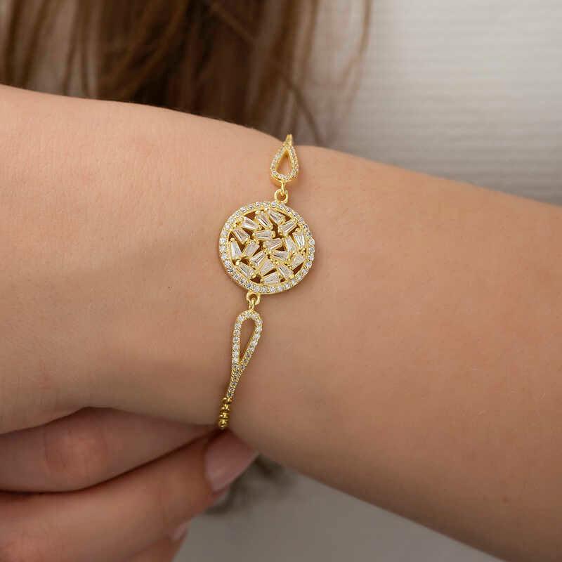 Bracelet en argent et or avec pierres baguettes