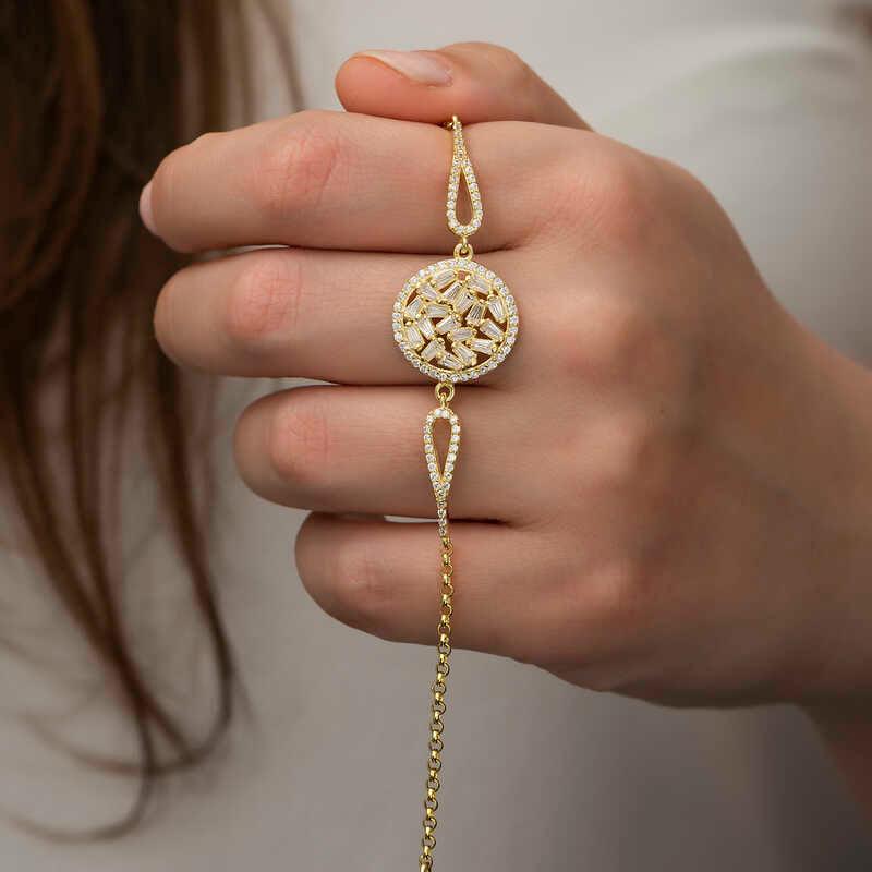 Bracelet en argent et or avec pierres baguettes