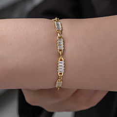 Bracelet pour femme en argent et or avec pierre baguette