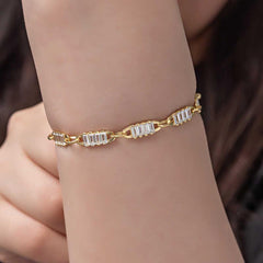 Bracelet pour femme en argent et or avec pierre baguette