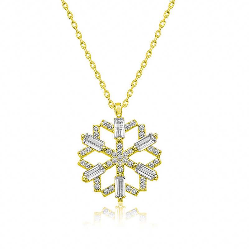 Collier flocon de neige en argent et or avec pierre baguette