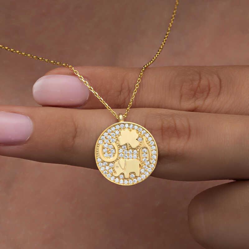 Collier porte-bonheur pour femme avec motif éléphant en argent et or