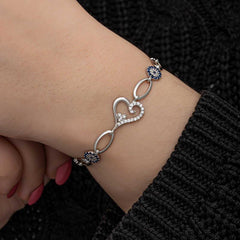 Bracelet femme en argent avec cœur et mauvais œil