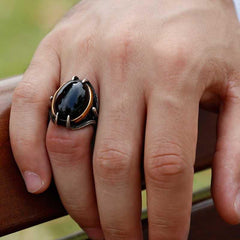 Bague homme en argent et pierre noire avec griffe d'aigle