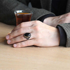 Bague homme en argent et pierre noire avec griffe d'aigle