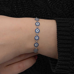 Bracelet femme en argent avec perles contre le mauvais œil
