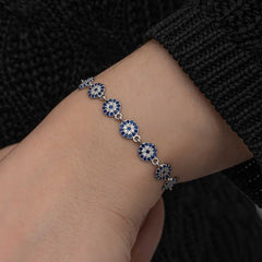 Bracelet femme en argent avec perles contre le mauvais œil