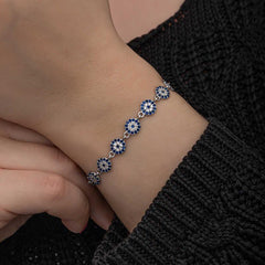 Bracelet femme en argent avec perles contre le mauvais œil