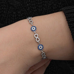 Bracelet infini en argent avec perles mauvais œil pour femme