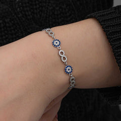 Bracelet infini en argent avec perles mauvais œil pour femme