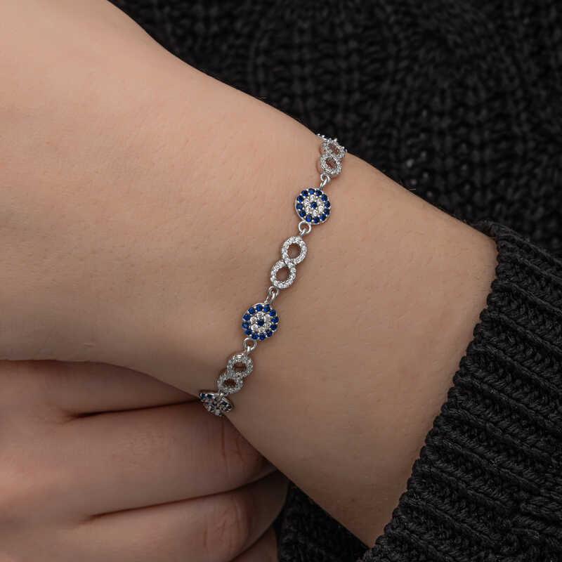 Bracelet infini en argent avec perles mauvais œil pour femme