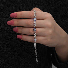 Bracelet infini en argent avec perles mauvais œil pour femme