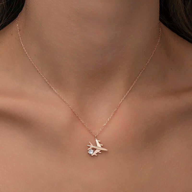 Collier pour femme en argent rose avec pierre unique représentant un avion