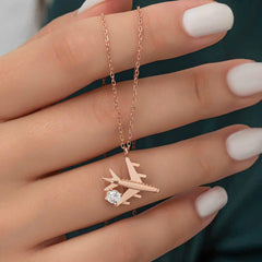 Collier pour femme en argent rose avec pierre unique représentant un avion
