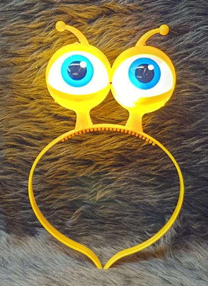 Couronne lumineuse à LED et à piles Nessiworld, 3 modes différents, œil extraterrestre, jaune, 18 x 12 cm